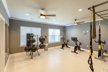 a group exercise room with yoga and cardio equipment at The Venue at 109 Apartments , Lebanon, Tennessee